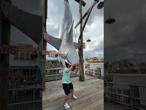 Man gets bitten by shark. AI video.